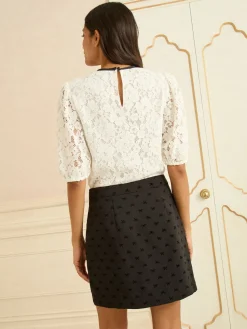 Love & Roses Mini Skirt Black Flocked Bow Print Hot