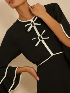 Love & Roses Bow Tipped Flute Sleeve Mini Dress Discount