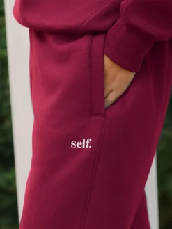 self. Red Cuffed Joggers Online