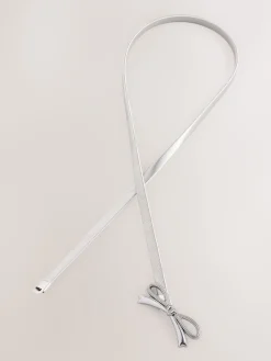 Next Skinny Stretch Belt Silver Bow Sale